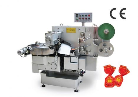 ​Máy đóng gói kẹo xoắn một đầu – May dong goi keo xoan mot dau