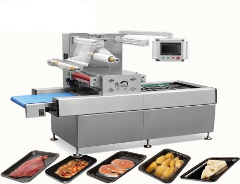 ​Máy đóng gói chân không hút sát da – May dong goi chan khong hut sat da