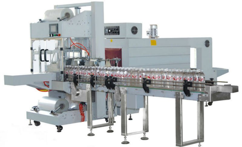 Máy co màng lốc chai tự động - May co mang loc chai tu dong
